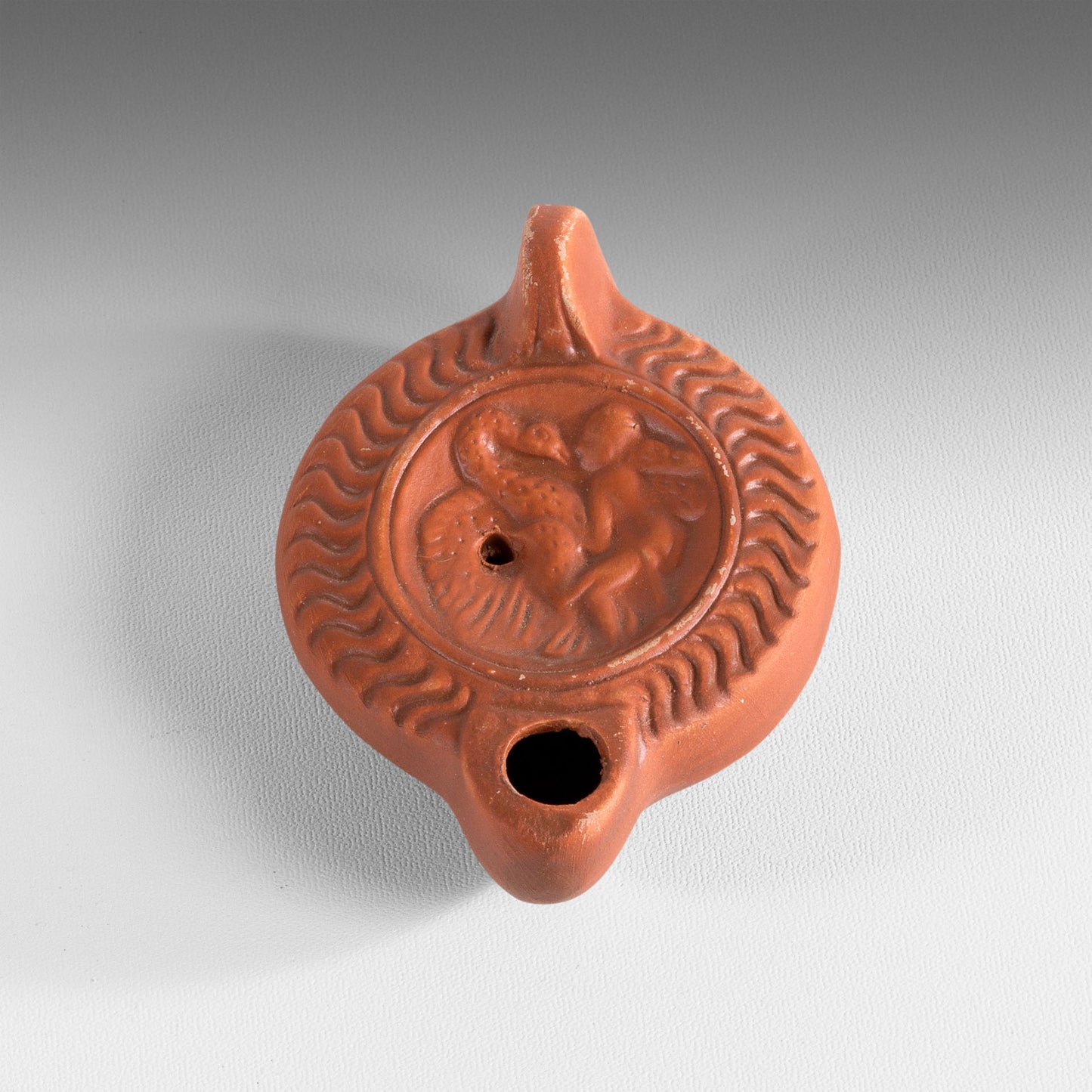 Petite lampe à huile Leda et le Cygne