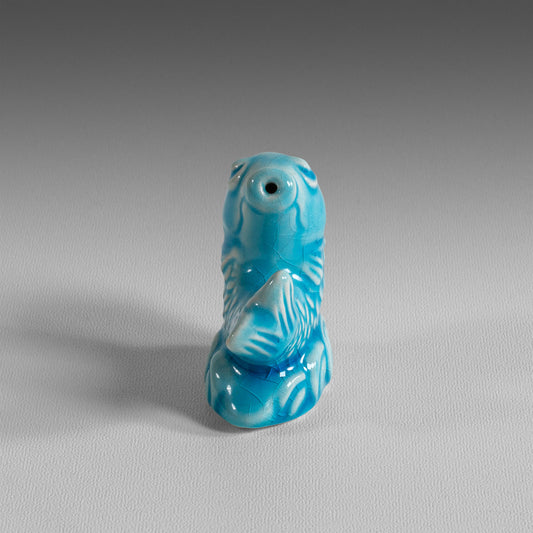 Petit poisson compte-gouttes émaillé