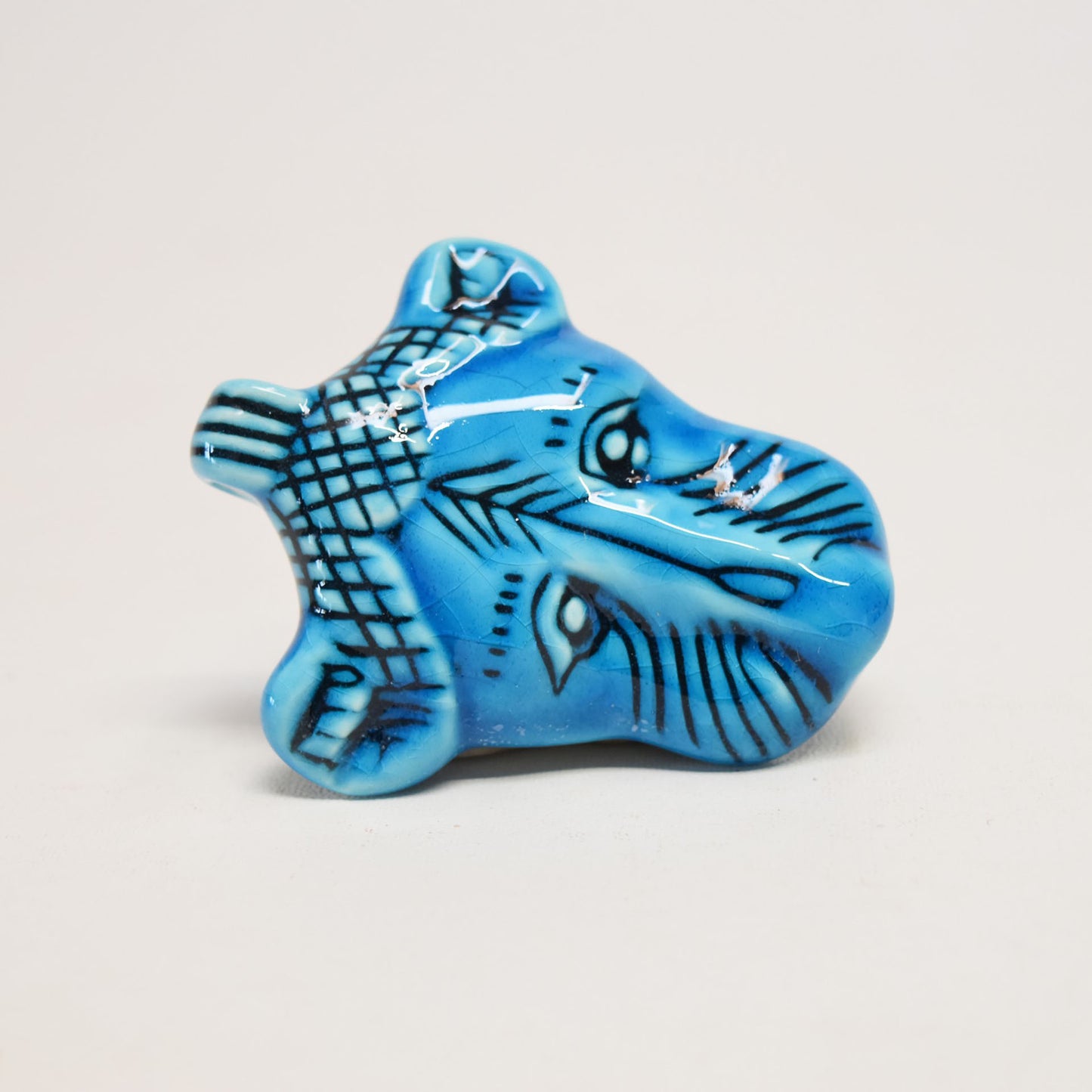 Pendentif tête de lion