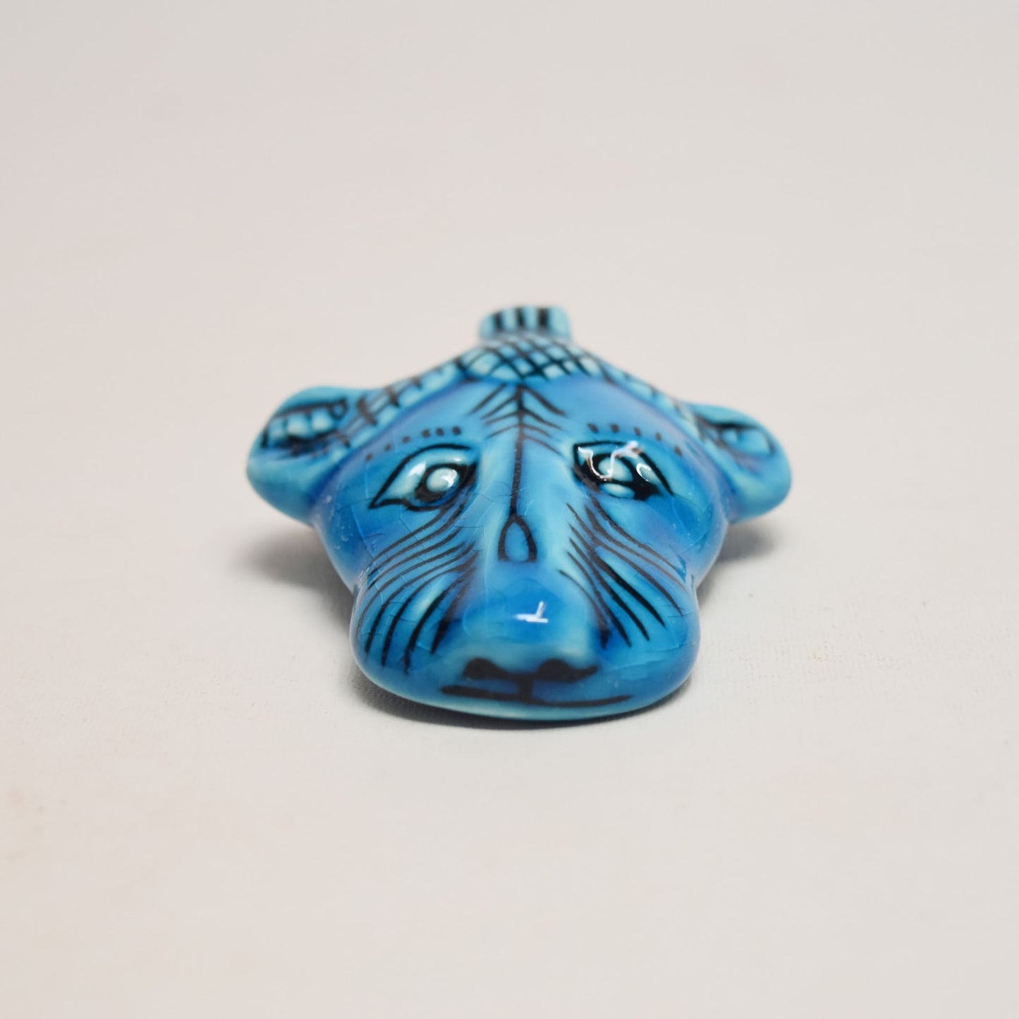 Pendentif tête de lion