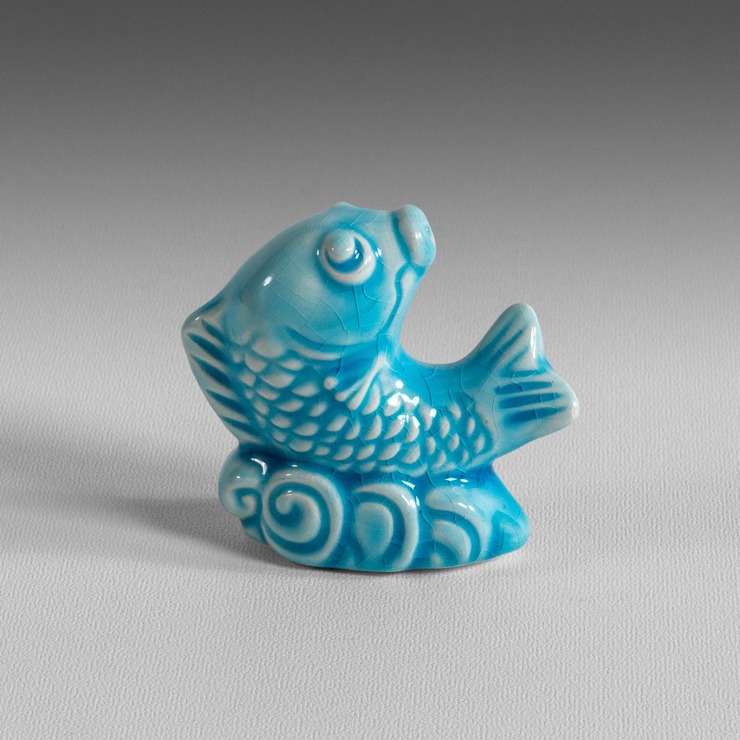 Petit poisson compte-gouttes émaillé