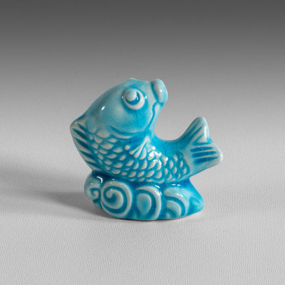 Petit poisson compte-gouttes émaillé