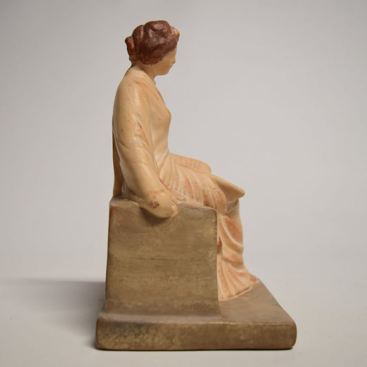 Tanagra assise