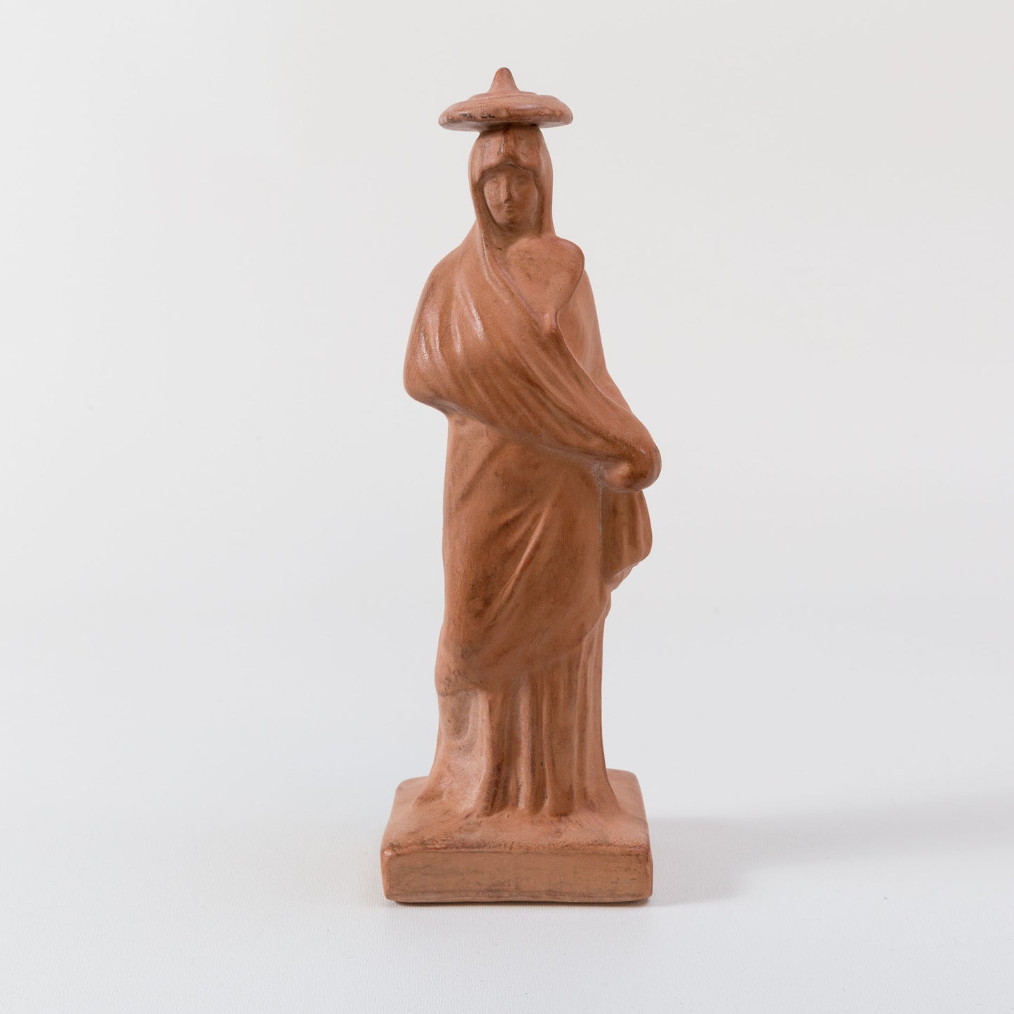 Tanagra au chapeau